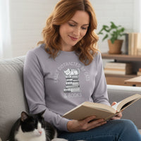 Load image into Gallery viewer, Easily Distracted by Cats and Books Premium Long Sleeve T-Shirt
